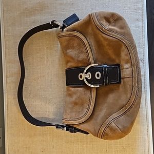 Coach light brown suede, dark blown lining, buckle and strap, with side pocket